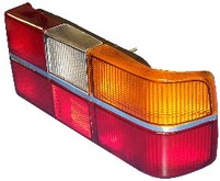 Volvo sedan 242, 262, 264 1979-1984 Tail light assembly with six light panels for Chrome Center Molding, Left side/Driver side 1234677 COMPLETE WITH BULBS,SOCKETS AND BULB HOLDERS