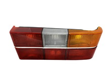 Volvo sedan taillight 240, 244, Tail light optical unit housing ONLY with CHROME center molding  Right side/Passenger side 1372227  