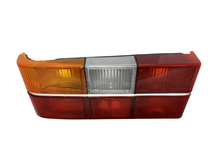 Volvo sedan tail light 240, 244, Taillight Optical Unit  HOUSING ONLY with CHROME Center Molding  Left side/Driver's side1372226 