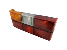 Volvo sedan taillight 240, 244, Tail light assembly with black center molding for Left side/Driver side  1372449C 