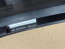 Volvo 240  station wagon , left rear drivers side bumper molding 1247261