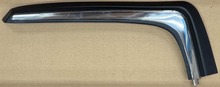 Volvo 240  station wagon , right rear passengers side bumper molding 1247262