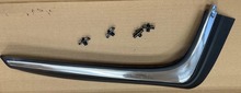 Volvo 240  station wagon , right rear passengers side bumper molding 1247262
